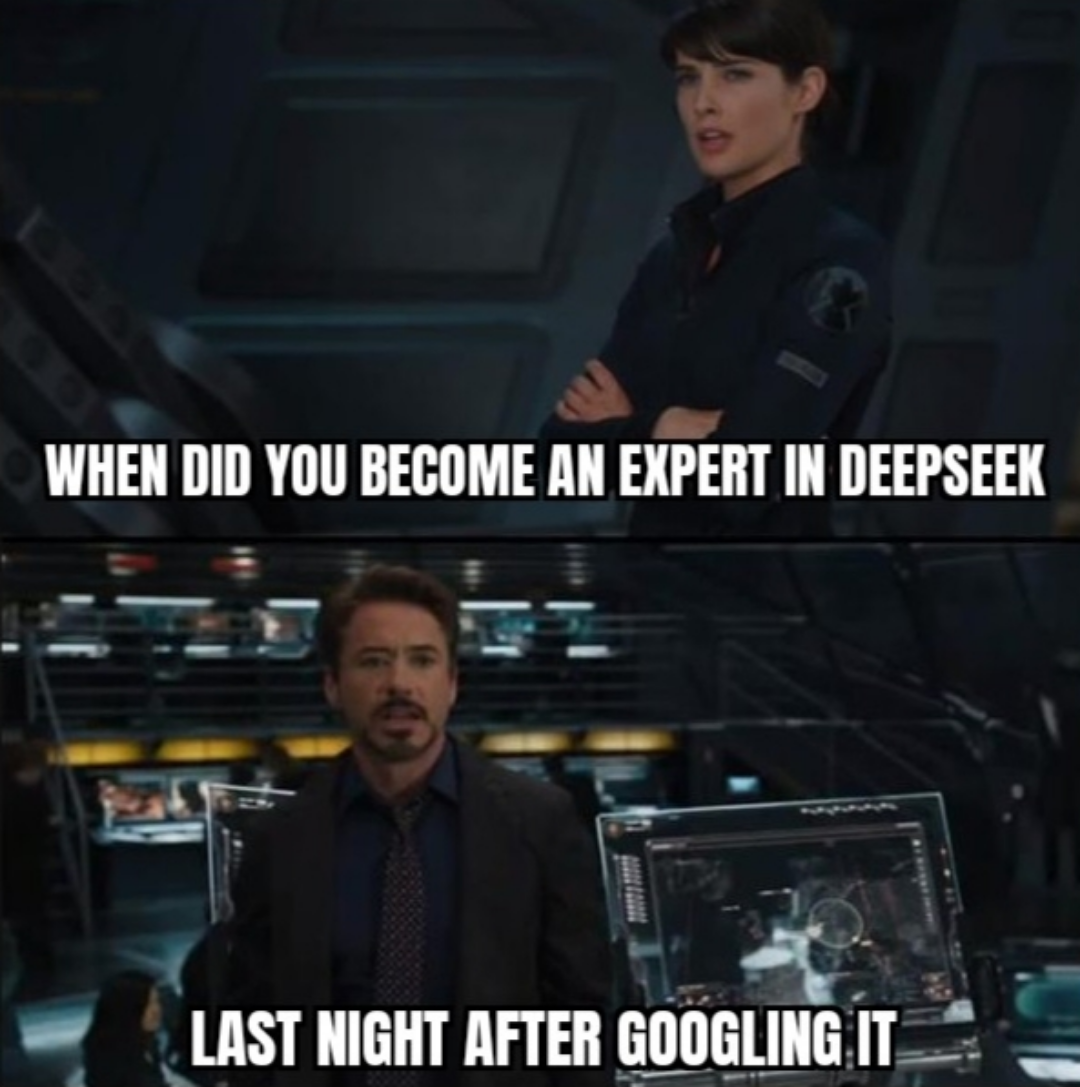 Two characters in an office setting. Top text: 'WHEN DID YOU BECOME AN EXPERT IN DEEPSEEK'. Bottom text: 'LAST NIGHT AFTER GOOGLING IT'.